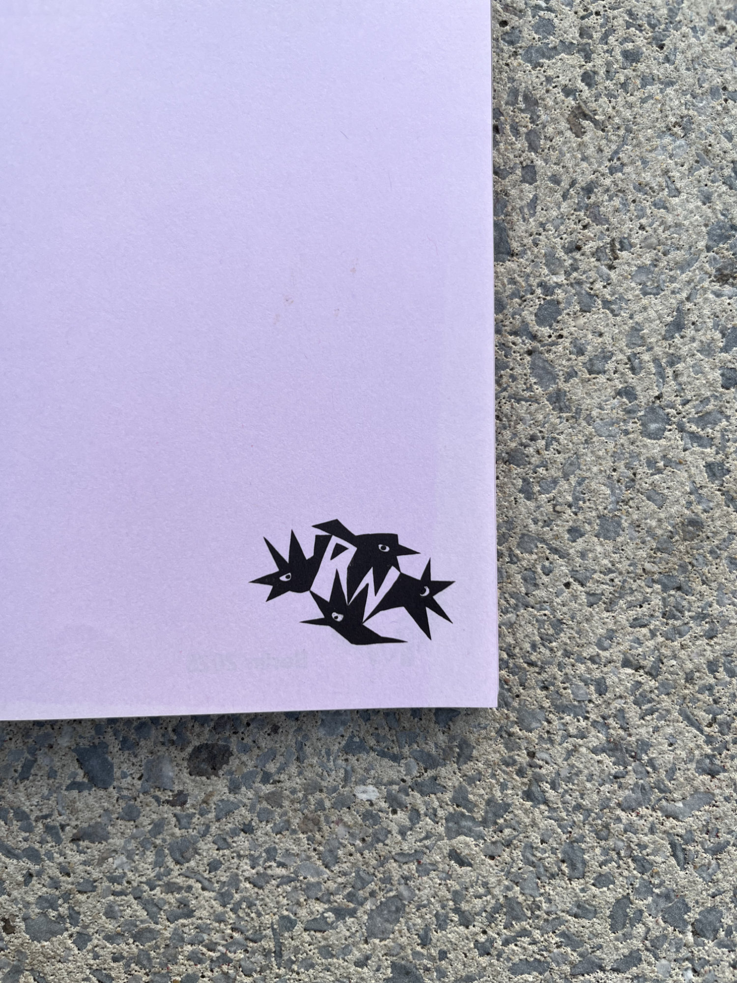 a lilac song book with tiny bird illustrations
